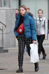 Minsk street fashion. 10/2019 (looks: blue quilted jacket, black jumper, black checkered trousers)
