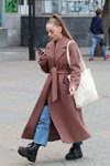 Minsk street fashion. 10/2019 (looks: coat, horsetail (hairstyle), sky blue jeans)