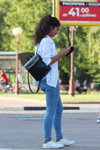 Street fashion. 08/2019 (looks: white blouse, sky blue jeans, white sneakers, black backpack, horsetail (hairstyle))