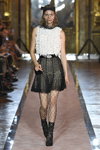 Jonna Blauert. Giambattista Valli x H&M show (looks: white top, black mini skirt, black large mesh tights, black lowboots, black veil)
