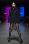 Noname Atelier show — Riga Fashion Week SS2021 (looks: black fishnet tights, black pumps, black blazer, black hoody)