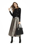 Glamour Party. Caroline Biss FW 19/20 lookbook (looks: black jumper, silver midi pleated skirt, black bag)