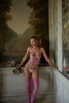 Hana Jirickova. For Love & Lemons for Victoria’s Secret – Holiday 2020 lingerie campaign (looks: fuchsia nylon stockings)