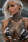 Labellamafia AW20 campaign (looks: black and white swimsuit, tattoo, blond hair)