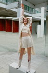 LeGer by Lena Gercke x ABOUT YOU SS 2020 campaign (looks: white shorts, white boots, white trench coat, white crop top)