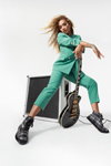 Rita Ora. ShoeDazzle x Rita Ora campaign (looks: turquoise pantsuit, blond hair)