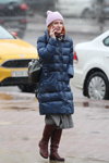Minsk street fashion. 02/2020 (looks: blue quilted coat, lilac knit cap, burgundy boots, grey skirt)