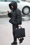 Minsk street fashion. 02/2020 (looks: black quilted jacket, black trousers)