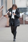 Minsk street fashion. 02/2020 (looks: black jacket, , black tights, black boots, black leather shorts)