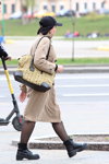 Minsk street fashion. 04/2020 (looks: black baseball cap, beige trench coat, black sheer tights, black boots)
