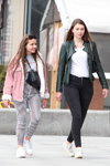 Minsk street fashion. 04/2020 (looks: pink jacket, striped black and white trousers, white sneakers, green leather biker jacket, white top, black jeans, white sneakers)
