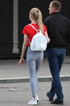 Minsk street fashion. 05/2020. Part 2 (looks: horsetail (hairstyle), red top, grey jeans, white backpack, white sneakers)