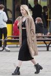 Minsk street fashion. 05/2020. Part 2 (looks: beige trench coat, black crop top, black midi skirt, black boots, blond hair)