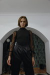 Presentación de Saint Key — Riga Fashion Week SS2022 (looks: jersey negro, pantalón negro)