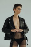 LAU jewellery 2020 lookbook (looks: black leather biker jacket, black sheer tights, black briefs)
