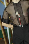 TOGA SS 21 campaign (looks: black transparent blouse, black belt)