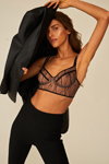 Undress Code SS 2021 lingerie lookbook (looks: black pantsuit, black transparent bra top)