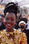 Lupita Nyong'o. Opening ceremony — 94th Oscars. Part 1 (looks: goldevening dress)