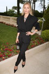 Elizabeth Sulcer. amfAR Gala Cannes 2022 (looks: black jumpsuit, black pumps)