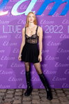 Guests — Etam Live Show 2022 (looks: black sheer tights, black mini skirt, black boots)