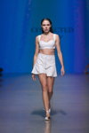 Pokaz Collected Story — Riga Fashion Week SS23 (ubrania i obraz: spódnica mini biała)