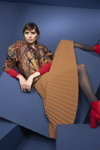 Deichmann AW 2022 lookbook (looks: red lowboots, brown pleated skirt, grey tights)