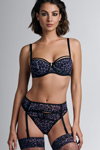 Marlies Dekkers FW 2022 lingerie campaign (looks: nude stockings with leopard print)