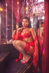 PrettyLittleThing Valentine's Day 2022 lingerie campaign (looks: red bra, nude stockings, red pumps)