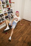 Primark SS 2022 campaign (looks: sky blue ripped denim shorts, white top, short haircut)