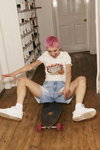 Primark SS 2022 campaign (looks: sky blue ripped denim shorts, white top, short haircut)