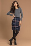 Roman Originals FW 22/23 lookbook (looks: grey jumper, blue checkered skirt, black tights, black lowboots)