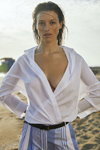Sara Roka SS 2022 campaign (looks: black belt, white blouse)