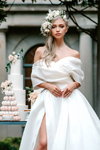 Adelina Tereshchenkova. "Time to Celebrate". Paulette Cleghorn for Yumi Katsura campaign. Fall 2022 (looks: white wedding dress)