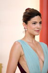 Monica Barbaro. Opening ceremony — 95th Oscars (looks: sky bluenecklineevening dress)