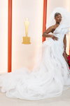 Tems. Opening ceremony — 95th Oscars (looks: whiteevening dress)