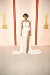 Halle Berry. Opening ceremony — 95th Oscars (looks: whiteevening dress with slit)