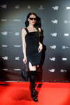 Guests — Riga Fashion Week AW23/24 (looks: blackcocktail dress, black knee high boots, Sunglasses)