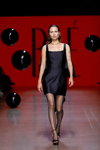 Pokaz BAE by Katya Shehurina — Riga Fashion Week SS24 (ubrania i obraz: sandały czarne, cienkie rajstopy czarne, sukienka mini czarna)