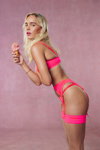 Scoops. Boux Avenue lingerie campaign (looks: fuchsia bra, fuchsia briefs, blond hair, fuchsia garter belt)
