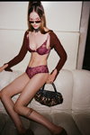 Passionata by Chantelle FW 23 lingerie campaign (looks: beetroot guipure bra, beetroot guipure briefs, Sunglasses, horsetail (hairstyle))
