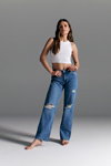 Denim Days. SiNSAY campaign (looks: white crop top, sky blue ripped jeans)