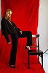 Ira. Photoshoot (looks: black pantsuit, black pumps)