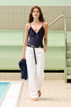 Desfile de OpéraSPORT — Copenhagen Fashion Week SS26 (looks: top azul, pantalón blanco, cinturón negro, )