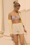 Кампания белья Etam FW26 (наряды и образы: голубой прозрачный бюстгальтер, желтые полосатые шорты)